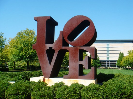 The famous LOVE sculpture created by Robert Indiana sits on the grounds of the Indianapolis Museum of Art. Image Credit: Tania Hussain