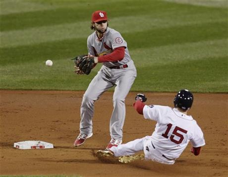 This missed catch error from the Cardinals' shortstop Pete Kozma (Which was ruled as an error after the umpires overturned a blown call) blew the game open for the opposing Boston Red Sox in the second inning of Game 1 at Fenway Park (photo: AP/Charles Krupa).