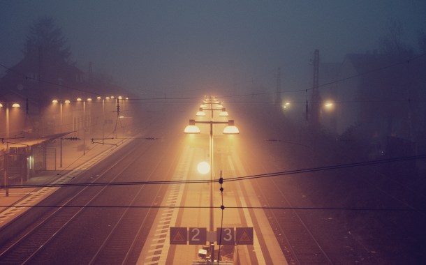 train station railway tracks fog
